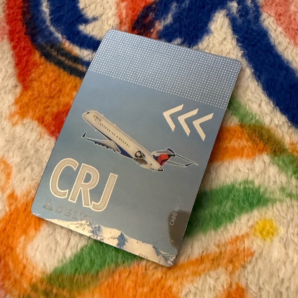 Delta Kids Trading Card - Blue and White
